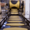 Maquina para acer tortillas donde se ve el cortador y como las tortillas pasan a los quemadores